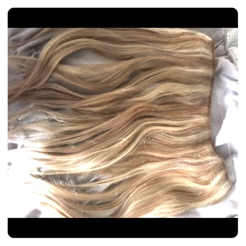Dark blonde light blond highlights extensions.